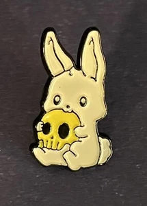 Bunny Gnawing on Skull Lapel /Hat Pinback White & Yellow on Black Plastic - Picture 1 of 2