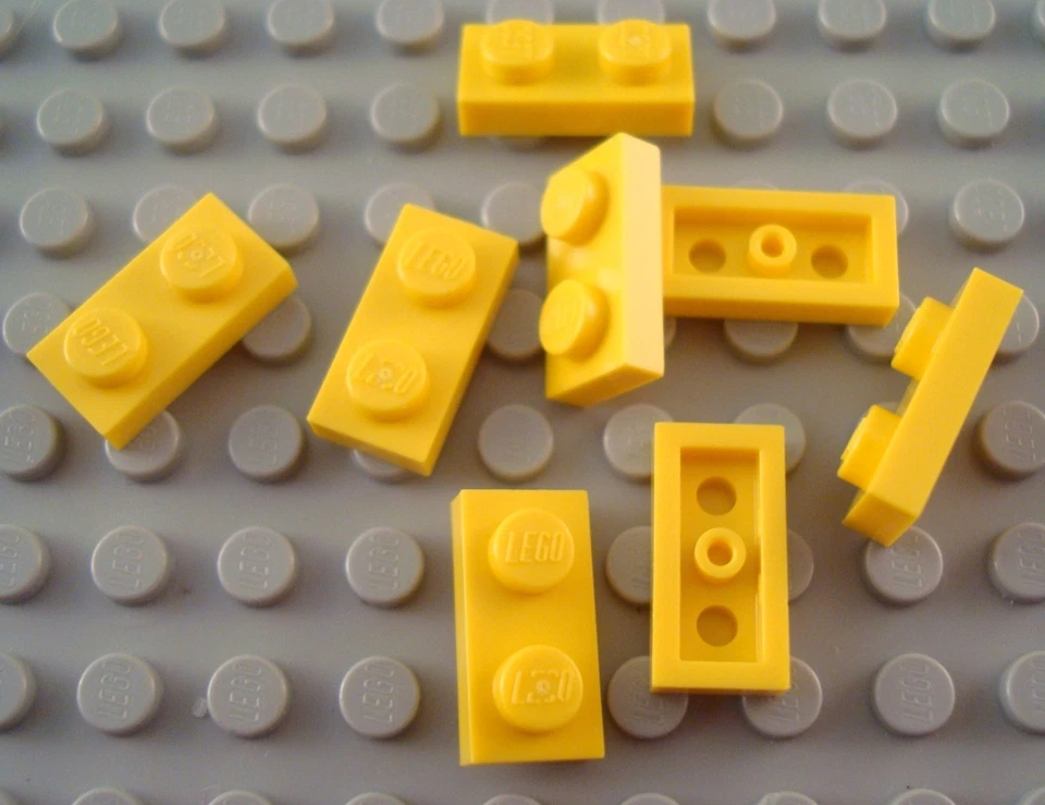 New LEGO Lot of 8 Yellow 1x2 Plate Parts and Pieces - Image 1 of 1