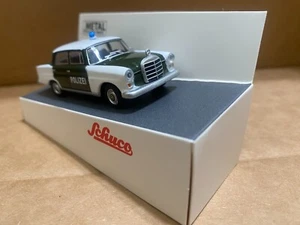 1/64 SCHUCO MERCEDES-BENZ 200 (W110) POLICE 1961 GREEN/WHITE - Picture 1 of 4