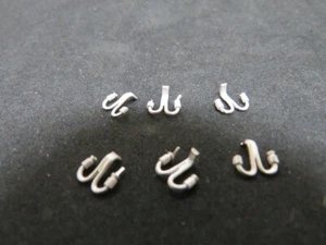 A.B.S SIDELINES 0 GAUGE  WHITE METAL TELEGRAPH INSULATORS for BARGEBOARDS  S.S82 - Picture 1 of 2