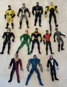 Konvolut 11 - DC Superhero Action Figuren - 1990-97 - Batman, Robin, Ridddler, Catwoman - Bild 1 von 2