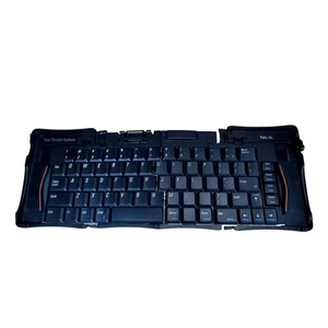 Clavier portable pliable Palm Pocket vintage vendu en l'état - Photo 1 sur 7