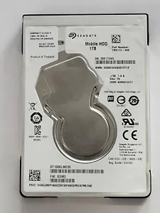 ST1000LM035, PN: 1RK172-286, SN: ZDE17GVQ, TK,FW: SDM2, Seagate 1Tb 2.5" HDD - Imagen 1 de 2
