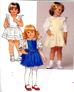 Uncut Sewing Pattern Girls Back Zipper Pinafore Dress Blouse Top Size 4 only - Picture 1 of 2