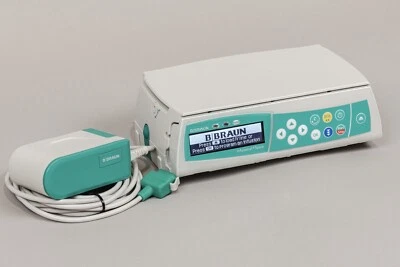 B Braun Infusomat Space Pump 8713051U - WIFI Battery 8713182U - AC Adapter -586U - Image 1 of 4