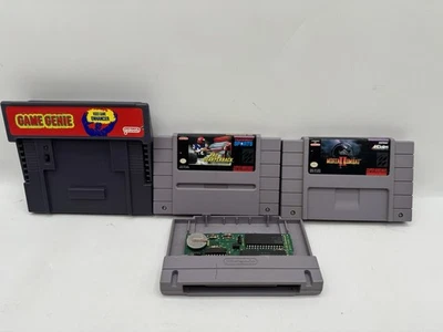 Lote de 3 Cartuchos Juegos Nintendo SNES + Accesorio Game Genie COMO ESTÁ SIN PROBAR Foto 1 de 4