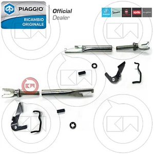 KIT RECUPERO GANASCE DESTRA E SINISTRA ORIGINALE PIAGGIO APE TM P703 FL2 220 cc - Foto 1 di 2