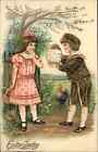 Easter Little Boy Gives Girl Giant Egg Gilt Inlay c1910 Vintage Postcard