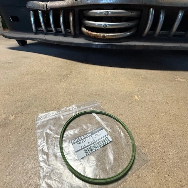 (1) Embalaje de bomba de combustible original Nissan 17342-7Y000 Foto 1 de 2