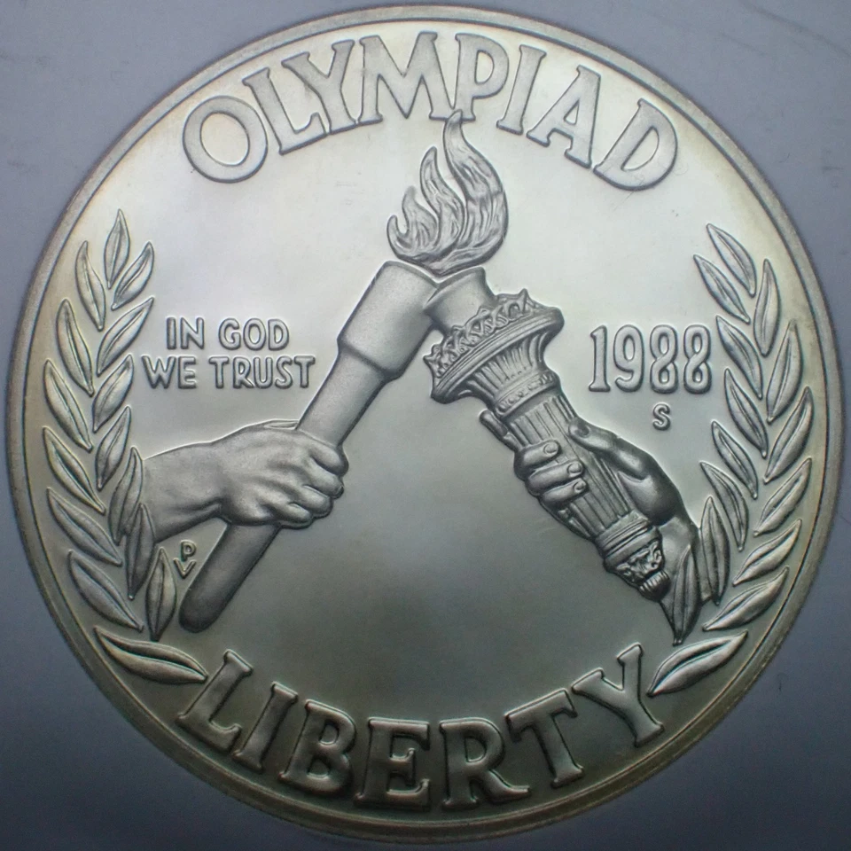 [151] 1988-S SEOUL OLYMPIAD Silver USA $1 Dollar NGC Proof 69 Ultra Cameo - Image 1 of 4