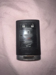 Key FOB maybe Cadillac - Picture 1 of 5