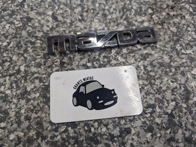 Mazda Miata OEM 90-97 Brand Badge Trunk Chrome - Image 1 of 4