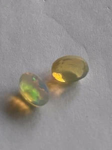 OPAL PAIR - 7 .0 x 5 mm. NATURAL FIRE OPALS . ETHIOPIAN. 100% GENUINE OPALS. - Picture 1 of 11
