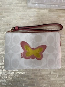 Coach Corner Zip Wristlet In Signature Canvas With Butterfly Chalk/Taffy Multi - Picture 1 of 6