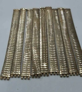Lotto 10 pezzi Cinturini elastici Swatch Lady Laminati oro - Originali - Imagen 1 de 3