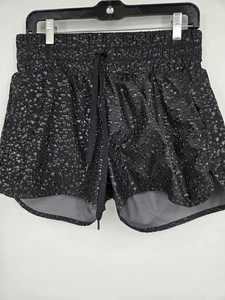 Pantalones Cortos Bomber ZYIA Active de tiro alto forro cordón gotas de agua estampado negro mediano - Imagen 1 de 6
