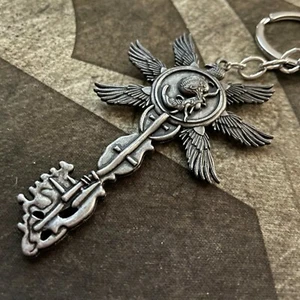 Resident Evil 8 RE8 Village Six-Winged Unborn Key Keychain - Picture 1 of 3