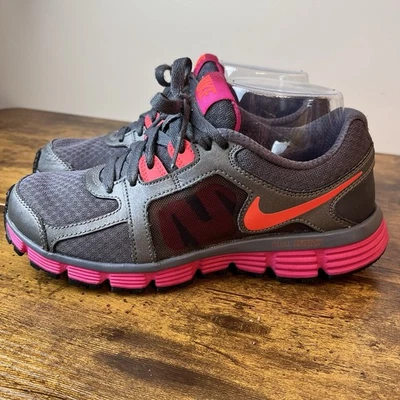 Usado en excelente estado! Mujer’s NIKE Dual Fusion ST 2’ Talla 6 Gris Rosa y Naranja Neón Zapatos para Correr Foto 1 de 4