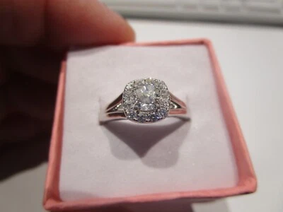 14K W.G. DIAMOND RING HALO DESIGN; CENTER CUSHION DIAMOND STONE IS .56 CT - Image 1 of 4