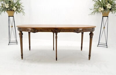 Mesa de comedor redonda con dos hojas grandes talladas acabado oliva ¡COMO NUEVA! Foto 1 de 4