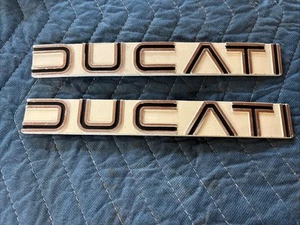 Ducati 860GT 860GTE Bevel pair of original gas tank emblems badges - Picture 1 of 3