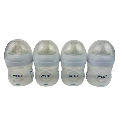 Lote de 4 biberones naturales Philips Avent 4 oz transparentes con pezones Foto 1 de 4