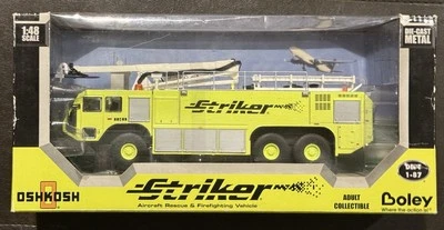 OshKosh Striker 3000 Airport Main Battle 6X6 Fire Truck Green 1:48 DIECAST Truck - Image 1 of 4