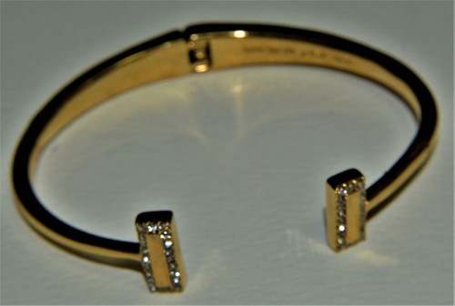 Bracciale aperto firmato KATE SPADE NY con sacchetto antipolvere strass tono oro