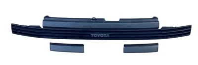 TOYOTA CELICA 1986-1989 PARRILLA DELANTERA Y JUEGO DE MOLDURAS DE FAROS Foto 1 de 4