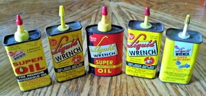 5 VINTAGE Flüssigkeitsschlüssel ÖLLDOSEN / DOSEN - 4 leer & 1 fast leer - Bild 1 von 2