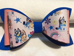 BLUEY AND BINGO 3 LAYER HAIR BOW. BLUE, PINK AND WHITE. 4.5" X 2.5". - Picture 1 of 3