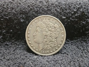 1887 Morgan Silver Dollar Ungraded (BB) - Picture 1 of 3