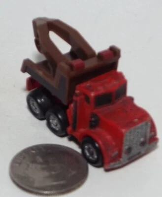 Small Micro Machine Plastic 6X6 Tow Truck in Red and Brown - Image 1 of 3