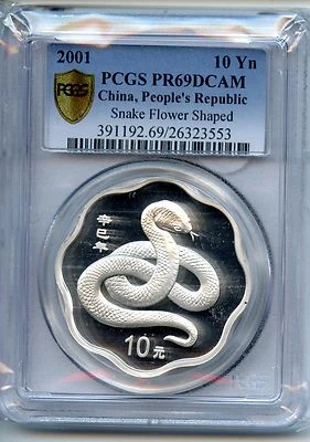 CHINA  2001  SNAKE  FLOWER SHAPED  PCGS PR 69 DCAM 10 YUAN  ONE OZ SILVER - Image 1 of 2