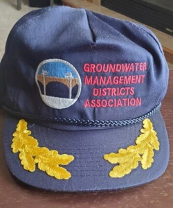 Vintage Grundwassermanagement Bezirksverband Druckknopflasche Mütze mit Krümmern - Bild 1 von 4