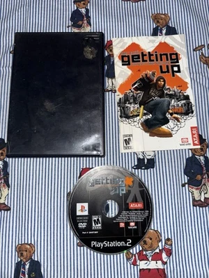 PlayStation 2 Marc Ecko's Getting Up: Contenuto Sotto Pressione PS2 Manuale Disco - Immagine 1 di 2