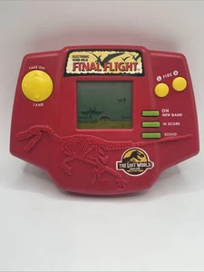 Jurassic Park Il Mondo Perduto Finale Volo Mano Gioco Elettronico 1996 Rosso MB - Foto 1 di 9