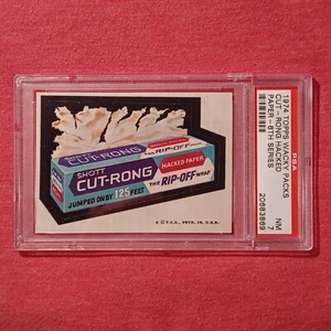 Topps 1974 Wacky Packs 6th Series: Cut-Rong Hacked Paper - PSA 7 - Picture 1 of 2