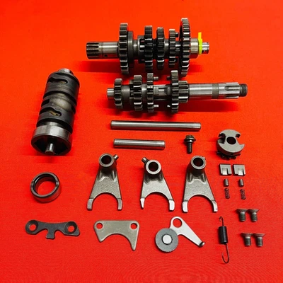 Коробка передач DRZ125 в комплекте подлинная от оригинального производителя SUZUKI DRZ 125 L 2003-2007 - Изображение 1 из 4