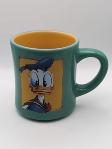 Walt Disney World "Donald Duck" Ceramic Mug - Bright Teal/Yellow- 12 oz. - Picture 1 of 5