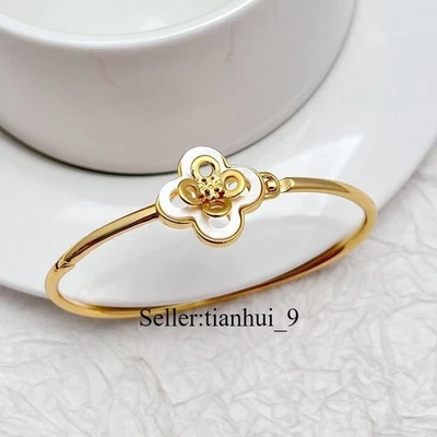¡Nuevo! Brazalete Tory Esmalte Blanco Diseño Flor en Dorado Tamaño: 6.5*5cm Foto 1 de 4