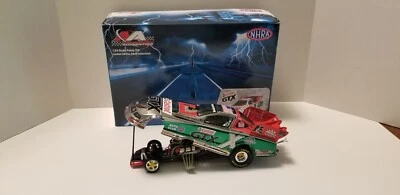 Mustang Castrol GTX 2006 John Force "color cromo" 1/24 de Action Racing Coll Foto 1 de 4