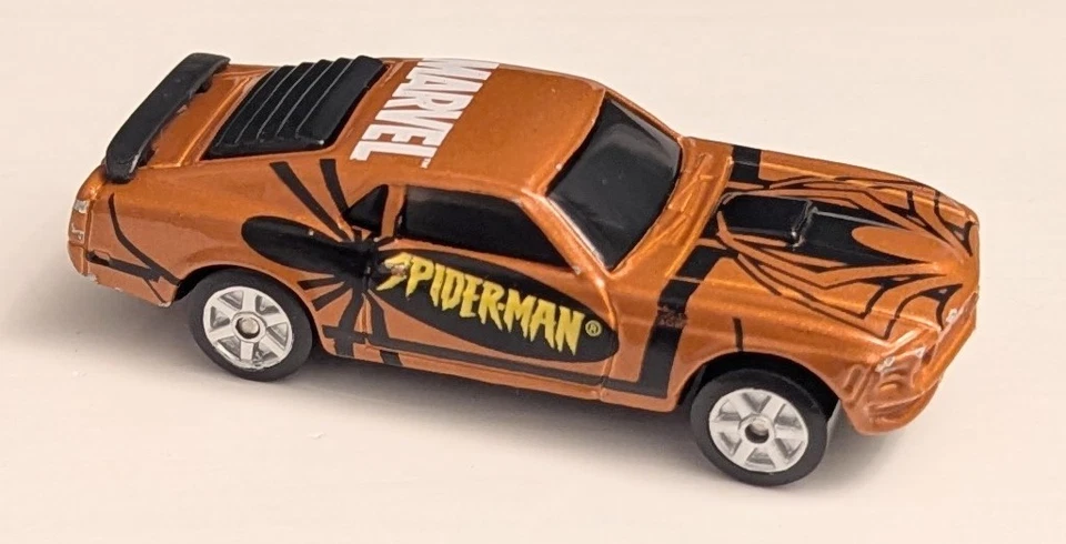 Raro Maisto Spiderman 1970 Ford Boss Mustang 1:64 metálico naranja quemado Marvel  Foto 1 de 4
