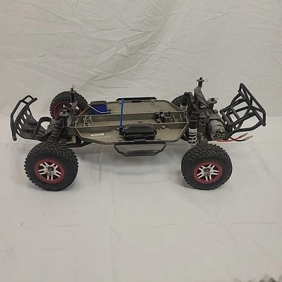 Traxxas Slash 2WD RC Truck Chassis Tires Shocks Parts Only As Is Read - Image 1 of 4