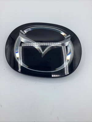 Mazda CX-5 2017-2024 parrilla delantera emblema radar logotipo TK79-51-730 OEM Foto 1 de 4