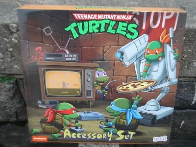 NECA TMNT BABY TEENAGE MUTANT NINJA TURTLES ACCESSORY SET BRAND NEW - Image 1 of 4