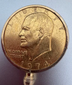 1974 EIESENHOWER DOLLAR GOLD IN COLOR WITH A BEZEL ATTACHED TO WEAR AS A NECKLAC - Picture 1 of 2