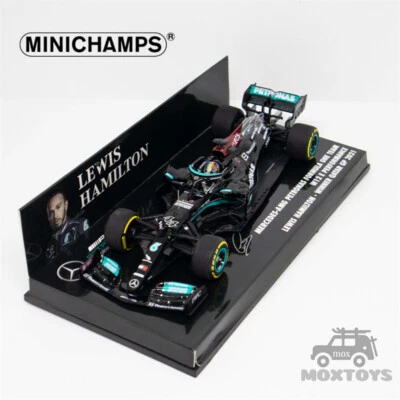 MINICHAMPS 1:43 2021 F1 MB PETRONAS W12 E No44 L.HAMILTON WINNER QATAR - Image 1 of 4