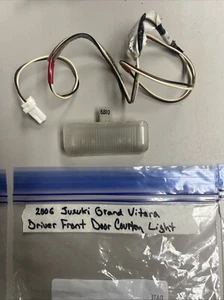 2006 Suzuki grand Vitara driver front door courtesy light - Picture 1 of 2