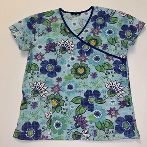 Blusa Médica S Just Love Enfermera 2 Bolsillos Turquesa Brillante Púrpura Flores Verano - Imagen 1 de 13